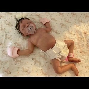 I am selling a fullbody sillicone baby girl.